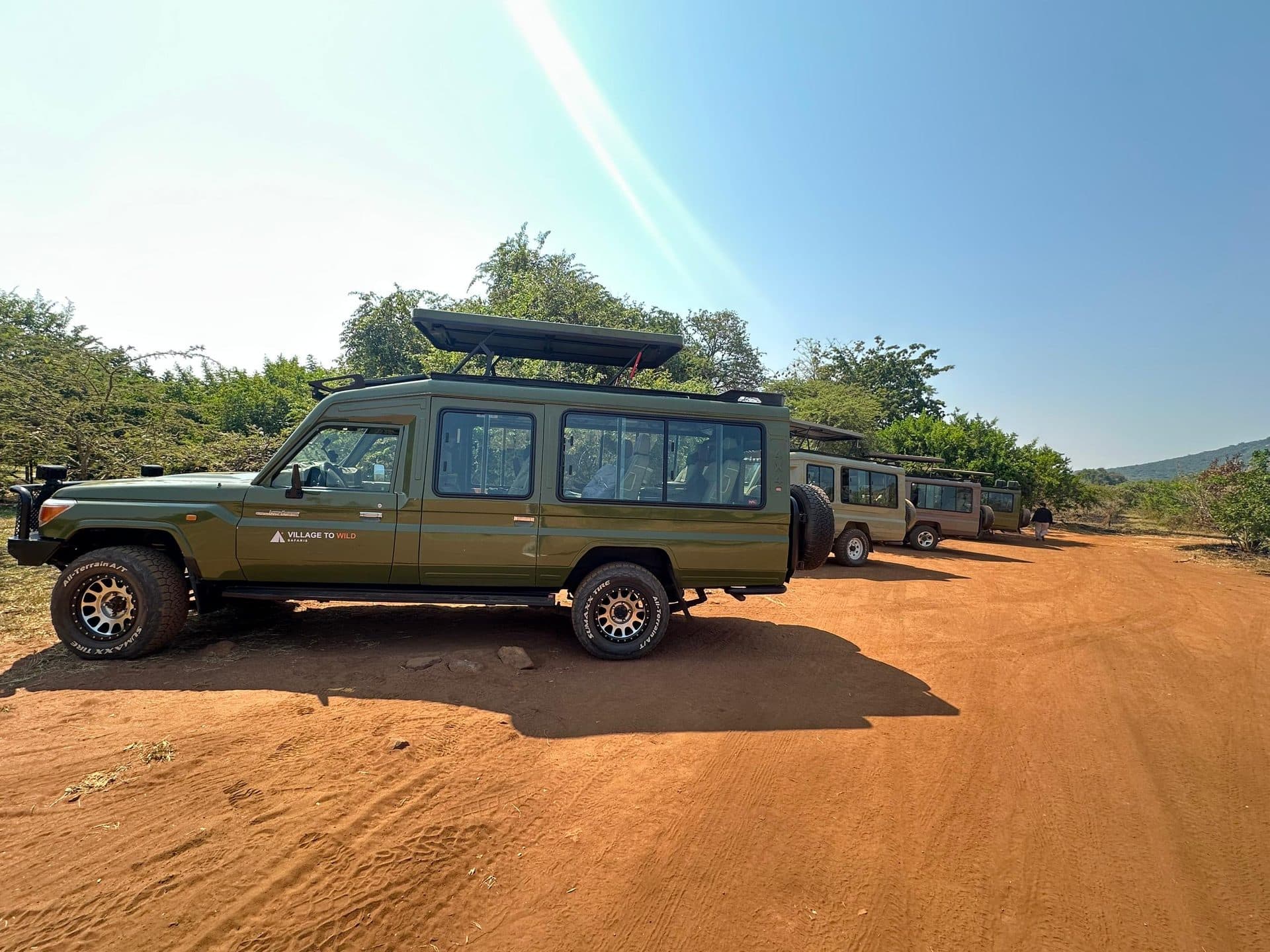 Village to Wild Safaris travelers on safari in Rwanda