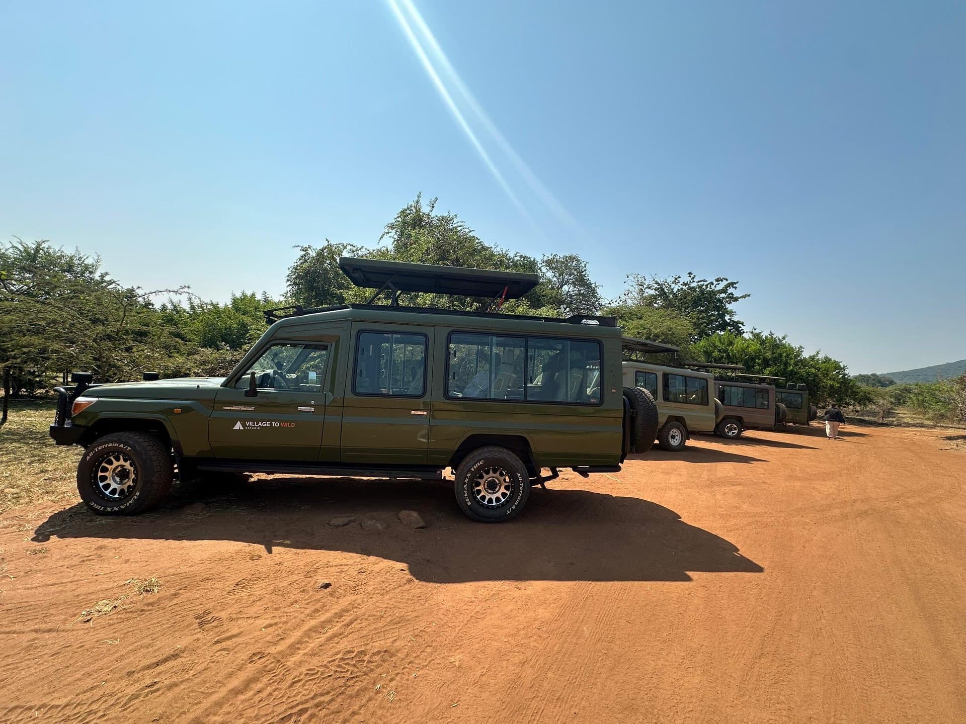 Village to Wild Safaris travelers on safari in Rwanda