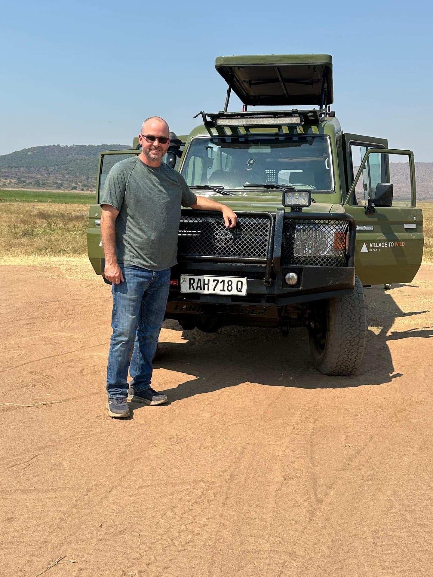 Village to Wild Safaris travelers on safari in Rwanda