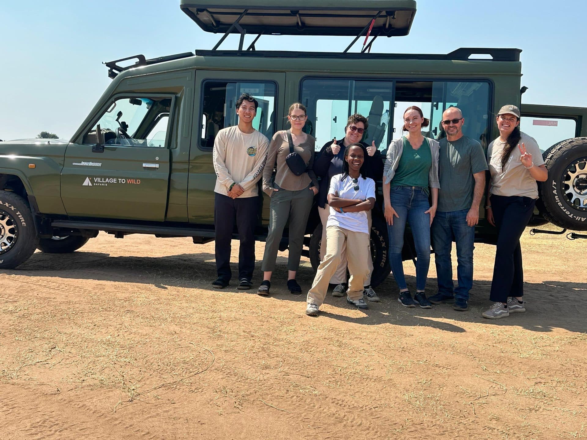 Village to Wild Safaris travelers on safari in Rwanda