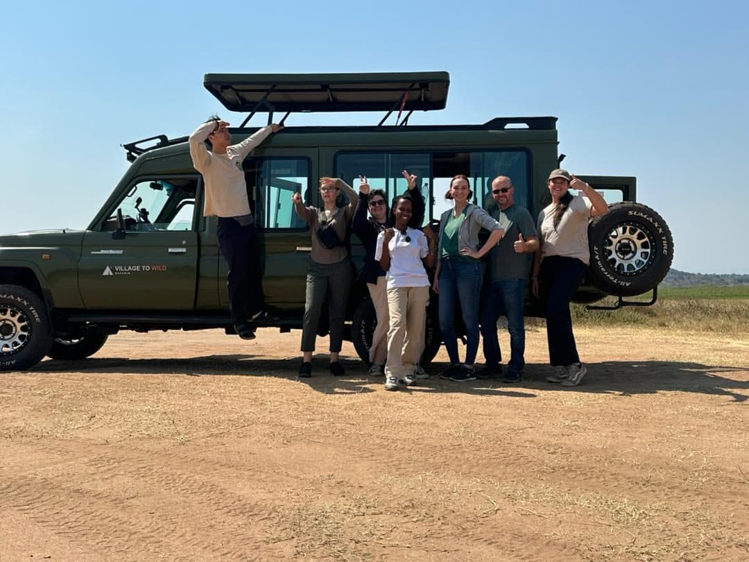 Village to Wild Safaris travelers on safari in Rwanda