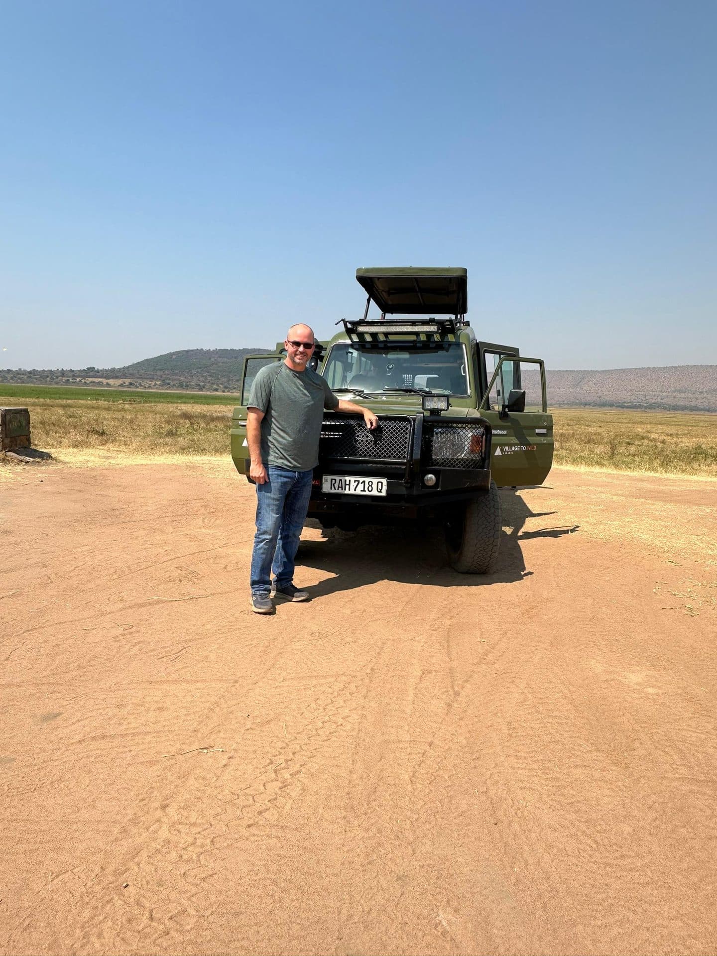 Village to Wild Safaris travelers on safari in Rwanda